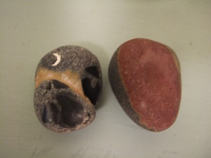 Stone with a crescent moon, and red stripe stone